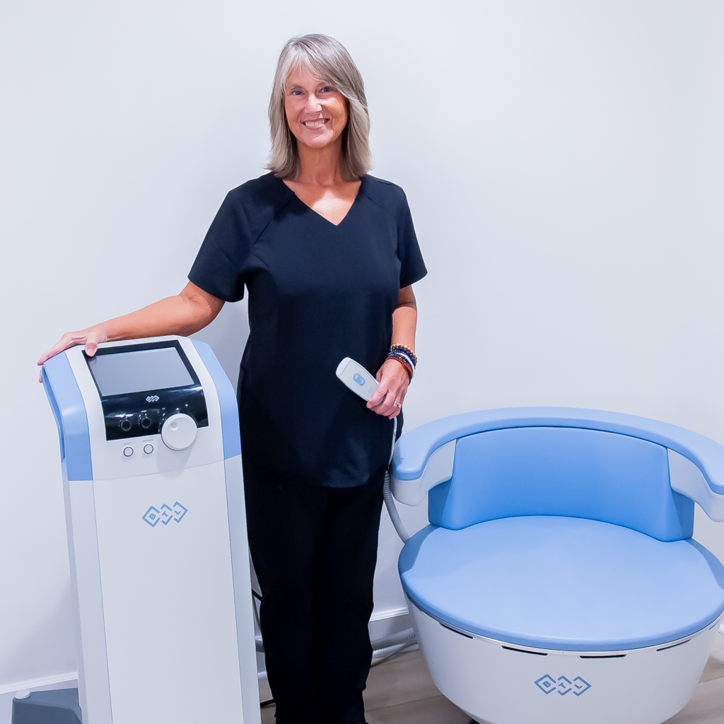 Nurse at EmSella machine for incontinence treatments